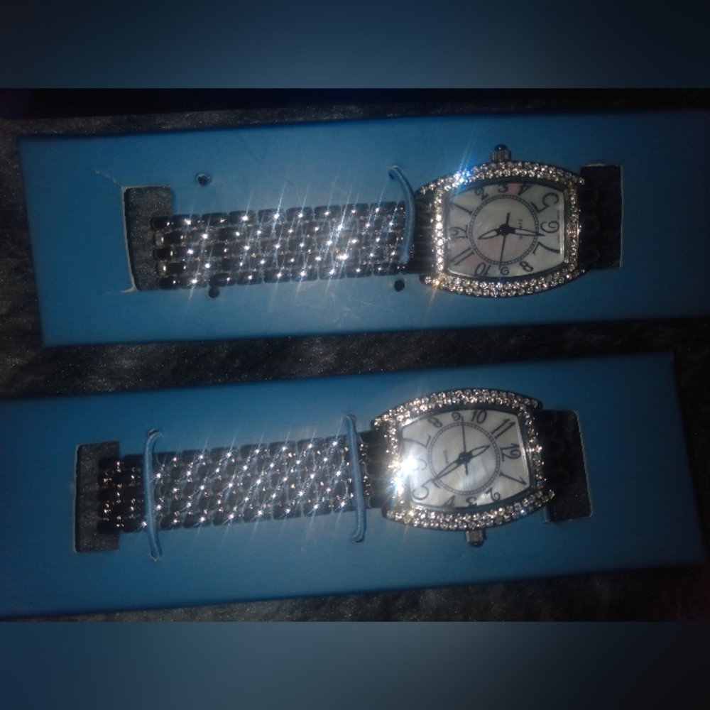 Elegant Silver and Black Watch with Rhinestones Avon
